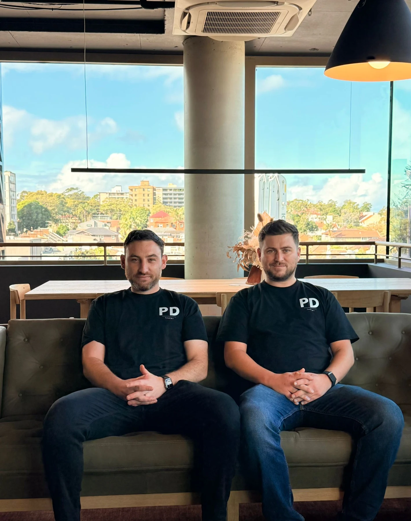 PD Talent co-founders Sean Donnelly and Lewis Perry in their branded PD shirts.